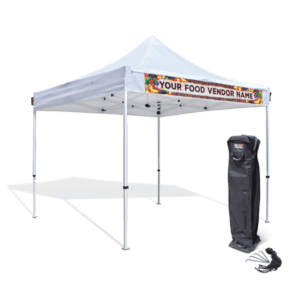 A 10'x10' Commercial Pop Up Canopy Tent in white, featuring a customizable front sign to display Your Food Vendor Name. It is set up on a flat surface and comes with a black carrying case and stakes for easy setup.