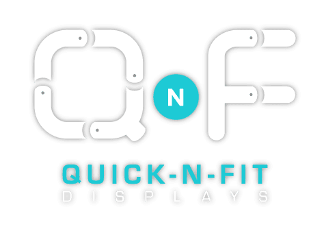 Logo for Quick-N-Fit Displays, featuring the letters Q and F in a snake-like style, with a booth-inspired round element between them containing the letter N. White and teal colors on a transparent background complete this sleek design.