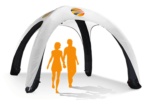 A white dome tent with four black legs is shown, resembling a custom inflatable tent. Two orange silhouettes of people walking beneath it are visible. The vibrant structure features a colorful logo near the top.