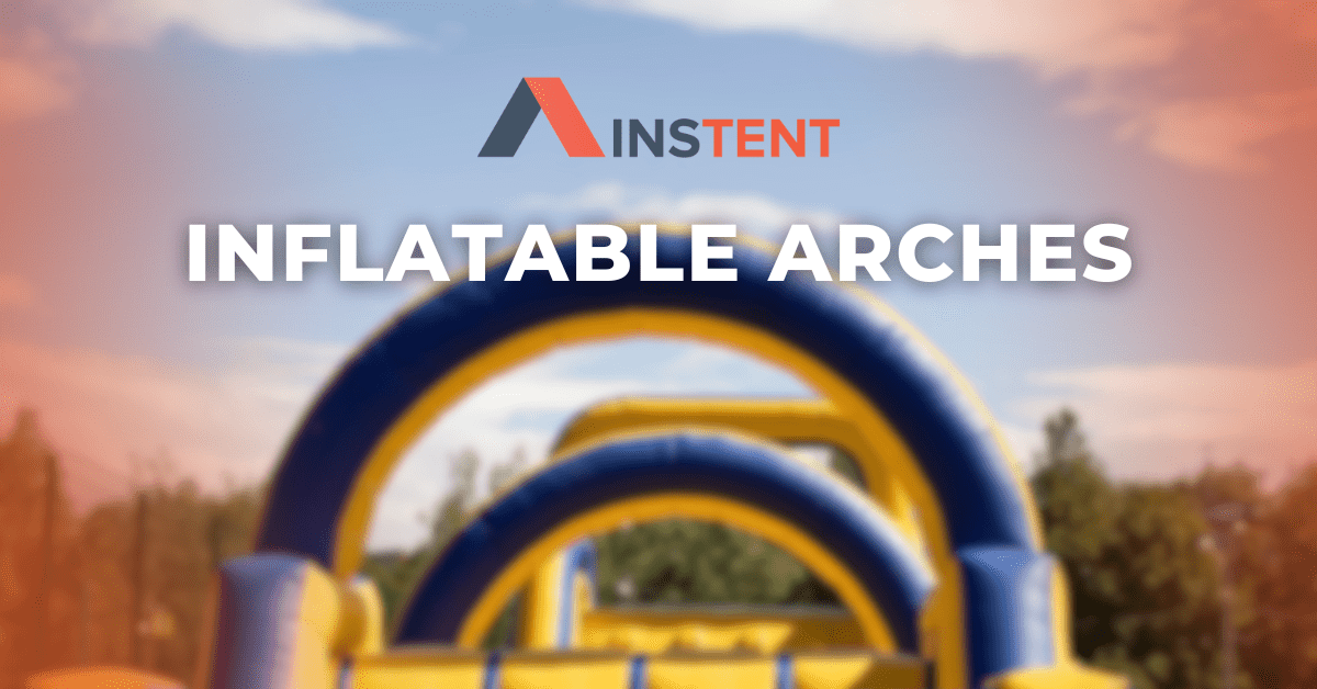 An outdoor scene showcases brilliant blue and yellow inflatable arches against a clear sky. The text "INFLATABLE ARCHES" stands out boldly. In the softly focused background, lush trees add a touch of nature to the striking display.