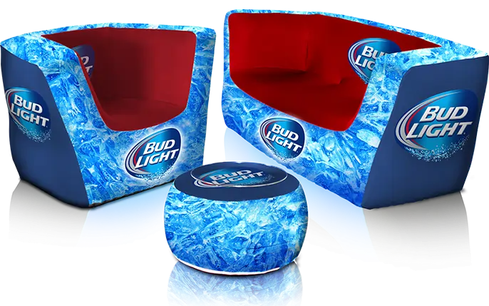 Two blue and red Bud Light-branded inflatable chairs with ice patterns flank a small round ottoman featuring the Bud Light logo on top.