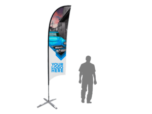 The 17ft Sunblade Flag displays a vintage blue car image, with YOUR LOGO HERE positioned on a white segment. A silhouette of a person is included for scale on the transparent background.