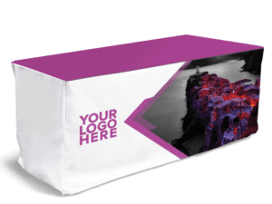 Introducing our Fitted Table Cover - Fully Printed, showcasing a geometric purple and white design. It features your branding, with "YOUR LOGO HERE" prominently displayed in purple on the side, complemented by an image of a vibrant coastal village.