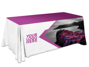 Introducing the Non-Fitted Table Cover - Fully Printed, designed with a customizable logo space. This table cover showcases a grayscale coastal village with a pink overlay on the front, offering a vibrant accent to any setting.