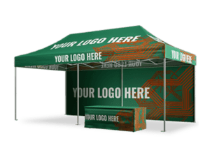 A 10'x20' Pro Plus Package includes a green pop-up tent with "YOUR LOGO HERE" printed on the canopy and side walls, featuring orange geometric patterns. Additionally, a matching table cover displays the same text and design, making this setup ideal for promotional use.