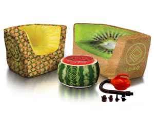 Three decorative bags with fruit designs: a pineapple-themed bag, a kiwi-patterned bag, and a watermelon-shaped bag, each featuring the Custom Air'Lounge logo and including a red pump and screws.